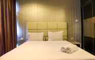 Bedroom 2 Elegant 1BR at Kemang Mansion Apartment