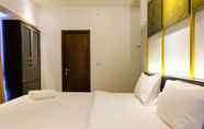 Bedroom 4 Elegant 2BR Apartment at M-Town Signature near Shopping Mall
