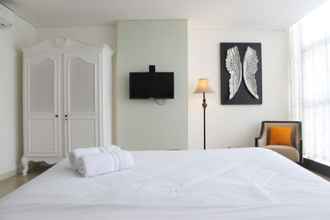 Kamar Tidur 4 Modern and Spacious 1BR Apartment at L'Avenue