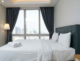 Bedroom 2 Modern and Comfortable 2BR at The Empyreal Condominium Epicentrum Apartment