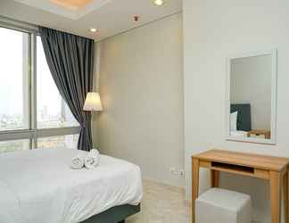 Bedroom 2 Cozy 2BR @ The Empyreal Condominium Epicentrum Apartment