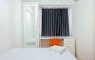 Bedroom 6 Pleasant 2BR Apartment at Bassura City near Shopping Mall