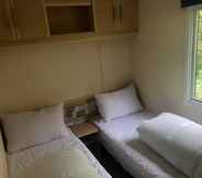 Bedroom 3 Captivating 2-bed Static Caravan in Holyhead