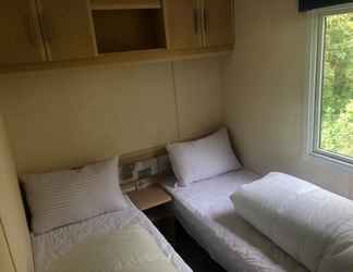 Bedroom 2 Captivating 2-bed Static Caravan in Holyhead