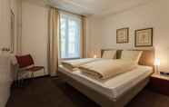 Bedroom 6 EMA House Serviced Apartments Unterstrass