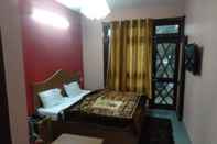 Bedroom ADB Rooms Hotel Devine Point, Shimla