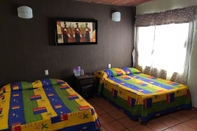 ห้องนอน Hotel Hacienda El Ceboruco