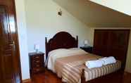 Bedroom 4 Villa com Piscina,caminha by Izibookings
