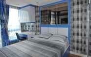 Kamar Tidur 6 Clean & Compact Room at Elpis sun rise view