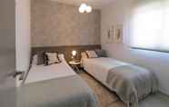 Kamar Tidur 4 Flamenca Village Mar Holidays