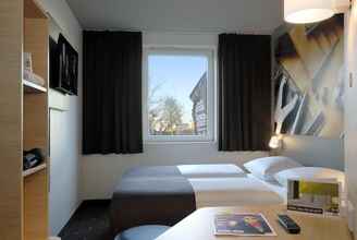 Bedroom 4 B&B Hotel Offenbach-Süd