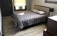 Bedroom 5 The 540 With Private Yard & Parking, Near Falls & Casino by Niagara Hospitality