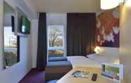 Bedroom 2 B&B Hotel Stuttgart-Bad Cannstatt