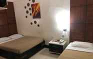 Bedroom 2 Marcian Business Hotel