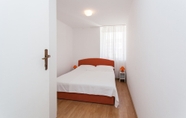 Kamar Tidur 7 Apartman Orange