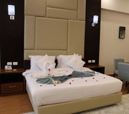 Kamar Tidur 2 Royal Jewel Al Raml Hotel