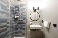 In-room Bathroom numa | Sketch Rooms & Apartments