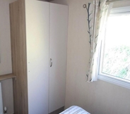 Bedroom 7 Comfortable 3-bed Caravan - Combe Haven