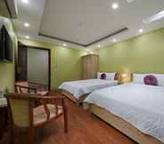Bedroom 7 Golden Lotus Airport Hotel