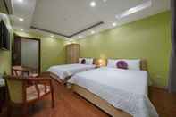 Bedroom Golden Lotus Airport Hotel