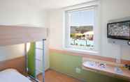 Bedroom 3 Ibis budget Lyon Est Saint Quentin Fallavier