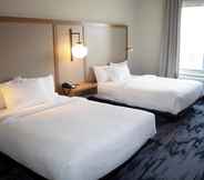 Bedroom 6 Fairfield Inn & Suites by Marriott Marquette