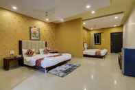 ห้องนอน Hotel Heera Excutive