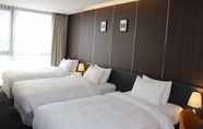 Bilik Tidur 5 Hotel Golden Daisy Seogwipo Ocean