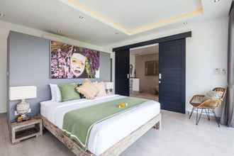 Kamar Tidur 4 Captivating Villa Walk to the Beach