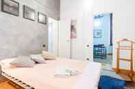 Bedroom Acquario & Porto Antico Bright Apartment