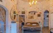 Kamar Tidur 4 Dimora Palmisano Villa & Trulli