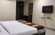 Kamar Tidur 2 Hotel City Square by KeyMagics