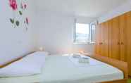Bedroom 4 Apartments & Rooms Maždin