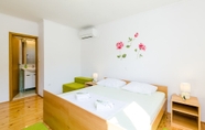 ห้องนอน 3 Apartments & Rooms Maždin