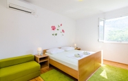 ห้องนอน 2 Apartments & Rooms Maždin