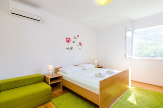 ห้องนอน 4 Apartments & Rooms Maždin