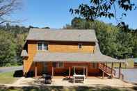 Exterior River Rock Cabin