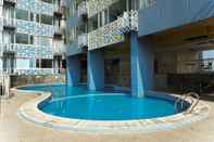 Swimming Pool Cozy and Minimalist Studio Apartment at Saladdin Mansion