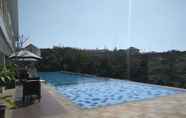 Swimming Pool 2 Wonderful Studio at Taman Melati Jatinangor Apartment with Mountain View