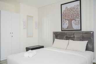 Bedroom 4 Chic and Spacious Studio at Bintaro Icon Apartment