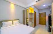 Bedroom 7 Homey and Warm Studio Apartment Oasis Cikarang