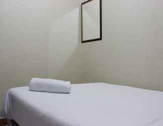 Bedroom 2 Pleasant 2BR Apartment at Gateway Ahmad Yani