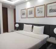 Bedroom 2 Premium 2BR Apartment near Marvell City Mall at The Linden