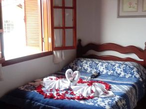 Kamar Tidur 4 Pousada Recanto Monte Suiço II