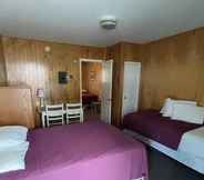 Bedroom 6 Boardwalk Sand & Surf Inn Oceanfront