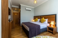 ห้องนอน Business Hotel Antalya