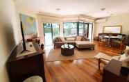 Common Space 5 2BR Beautiful River Retreat Pool Wine Gym Netflix