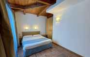 Bedroom 3 Le Mandrelle Beach Resort