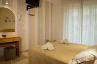 ห้องนอน Hotel Arlecchino
