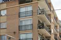 Exterior Re-imagined Urban Flat With Skyline View Balcony